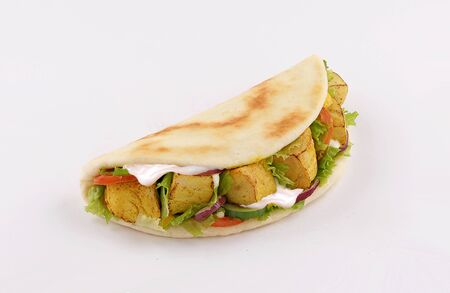 shish taouk, curry tandoori sandwich in naan bread, on white backgroundの写真素材