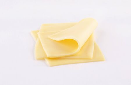 deli cheddar, gouda, emmental cheese slices on white background