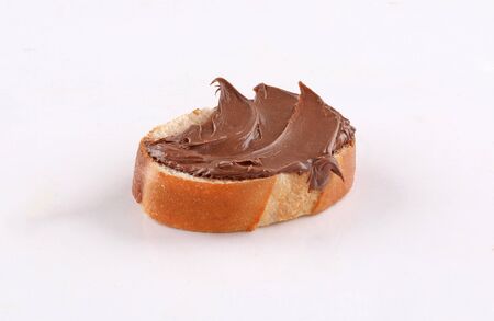 spread chocolate french bread,  canape, spanish tapas on white backgroundの写真素材