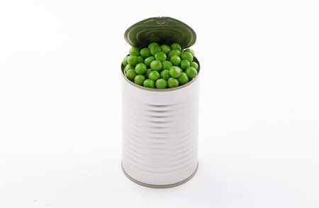 Open tin cans green Peas canned food Aluminum on white backgroundの写真素材