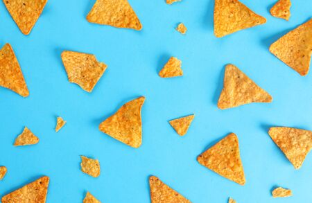 pattern mexican nachos chips on blue background top viewの写真素材