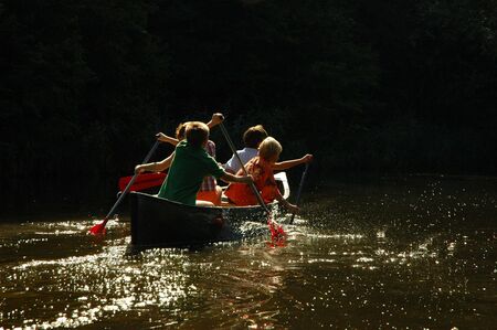 Boys in a canoeの写真素材