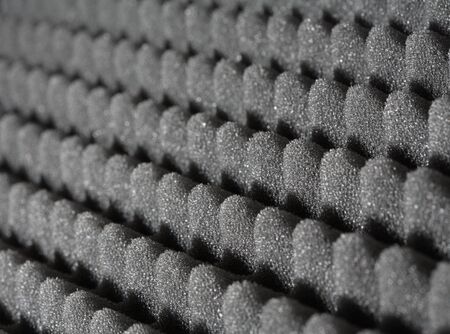 Bumpy open-cell foam rubber. Short depth-of-field.の写真素材