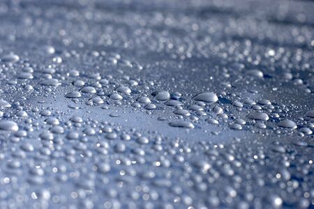 Water droplets on a car.の写真素材