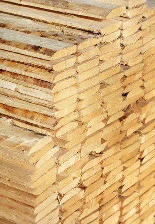 Rough timber stacked. Short depth-of-field