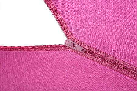 An opening zipper revealing a white surfaceの写真素材