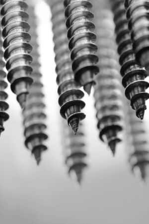 A Black and white image of stainless screws, Short depth-of-field