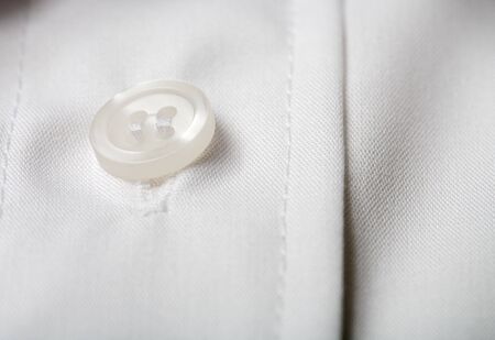 Closeup of a white dress shirtの写真素材
