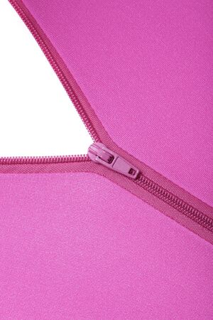 Zipper of a fuchsia colored garmentの写真素材