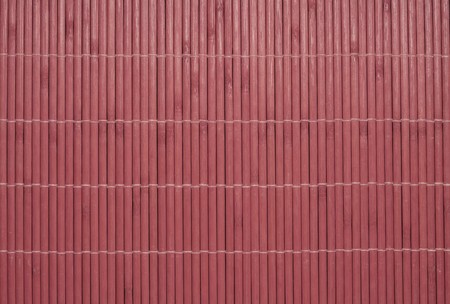 Background made of red bamboo stripsの写真素材