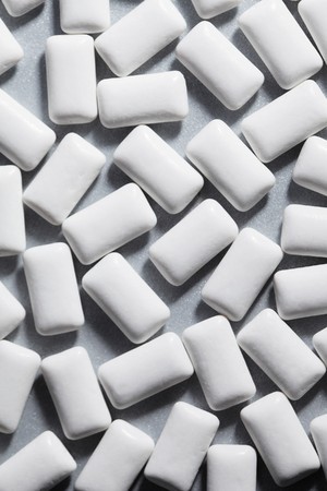 White chewing gum on greyの写真素材