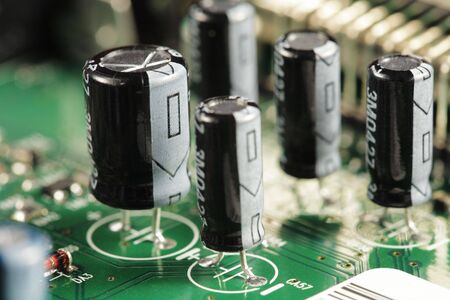 Capacitor electrical components on a circuit boardの写真素材