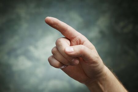 A man pointing with index fingerの写真素材