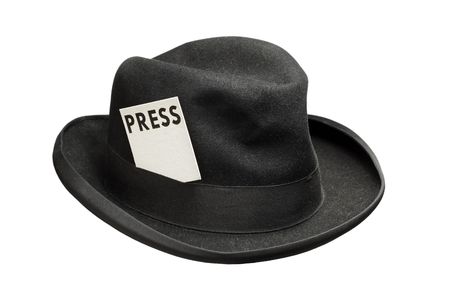 Old fedora felt hat with a press cardの写真素材