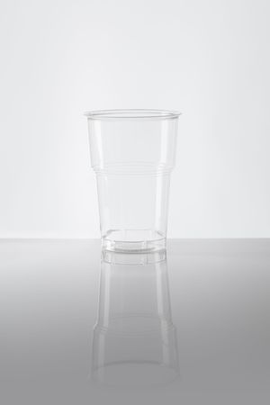 Empty disposable plastic cup made of clear plasticの写真素材