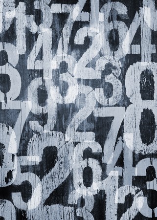 Background texture with photomanipulated worn and distressed numbersの写真素材