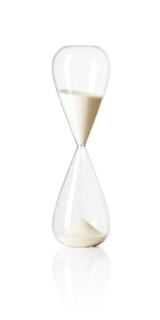Hourglass isolated on white reflective background.