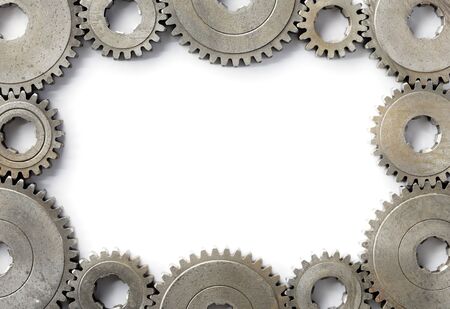 Background image with a frame made of old cog gear wheels.の写真素材