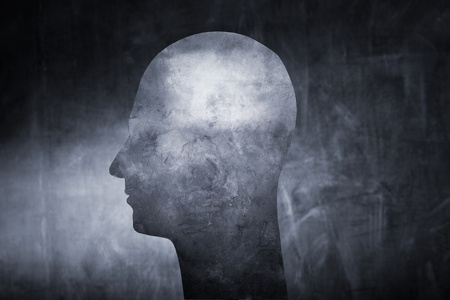 The Shape of a human head cut from cardboard.の写真素材