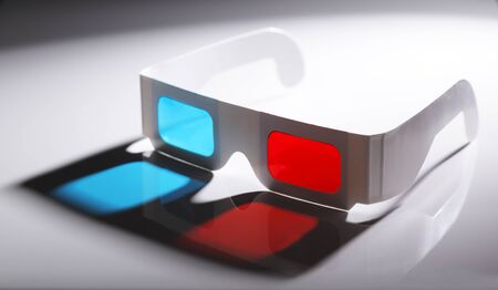 Disposable cardboard 3D Anaglyph glasses with cyan/red lenses.の写真素材