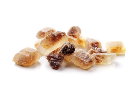 Crystals of Candi sugar / Rock sugar isolated on white with natural shadows.の写真素材
