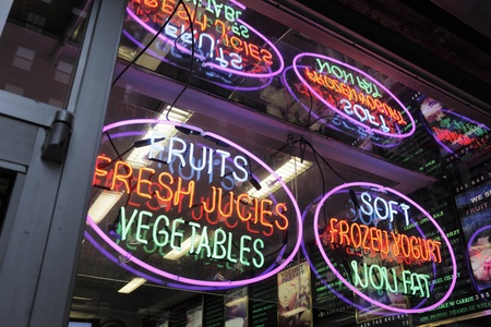 NEW YORK CITY, USA - JUNE 9: Neon signs in a deli window. June 9, 2012 in New York City, USAのeditorial素材