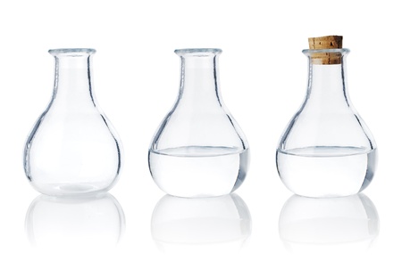 Same old fashioned glass bottle in three different stages.