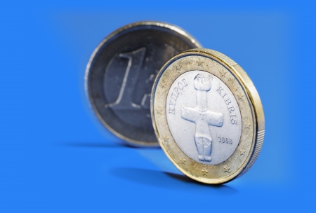 Euro coins from Cyprus on blue background.の写真素材