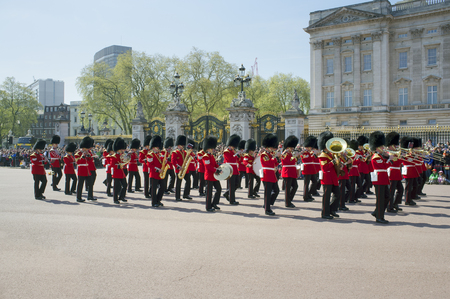 LONDON, UK - APRIL 16, 2014: Changing the Guard at Buckingham Palace in Londonのeditorial素材