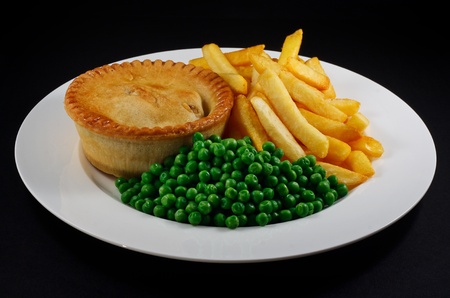 Pie and chips with peas  A traditional British Bar Dishの写真素材