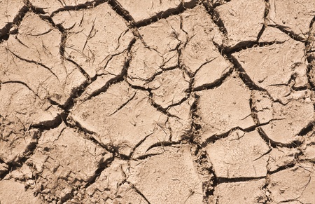 Cracked soil caused by lack of or poor rainfall, possible result of global warmingの写真素材