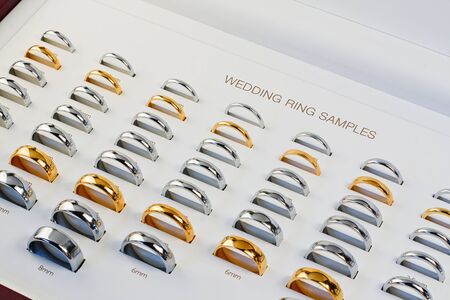 A Wedding Band Sample box with all the popular styless and a variety of sizes to help choose the perfect ringの写真素材