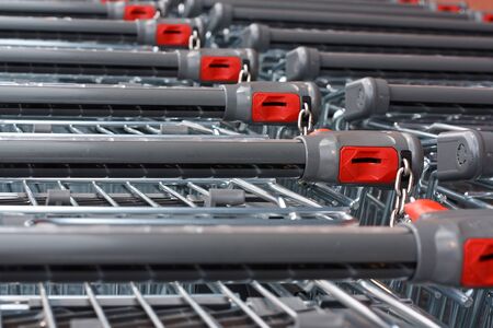 Rows of unbranded shopping carts at the hypermarketの写真素材