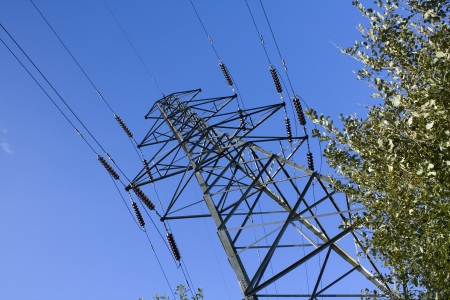 Electricity pylons used to distribute national grid energy over land often contested for planning...
