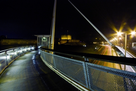 Carlisle Castle at night from the millennium bridge over the Castle way dual carriagewayのeditorial素材