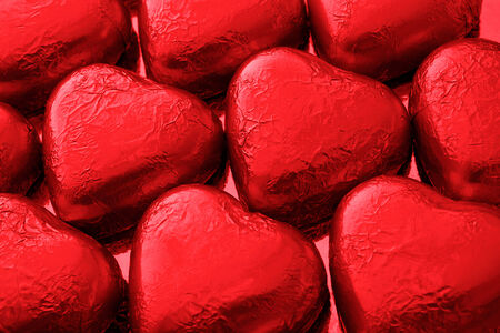 Red chocolate love hearts a great gift from a luxury chocalatier for saint valentines dayの写真素材
