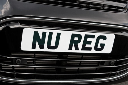 New Registration plate on a car for sale, symbolising the increase in sales which often occurs after the annual update of reg numbers.の写真素材