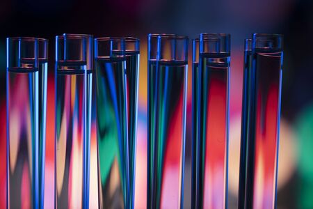 Laboratory theme.  Laboratory experiment. Test tubes. Scietific lab concept. Colorful bokeh.の写真素材