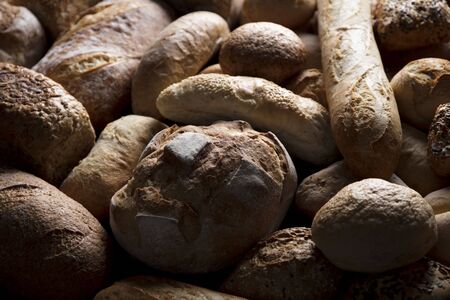 Baked goods. Mixed bread top view studio shots.の写真素材