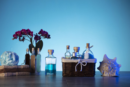 Spa and wellness products on the blue background.の写真素材