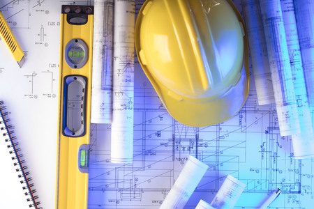 Contractor concept. Construction blueprints with tools, top view.の写真素材