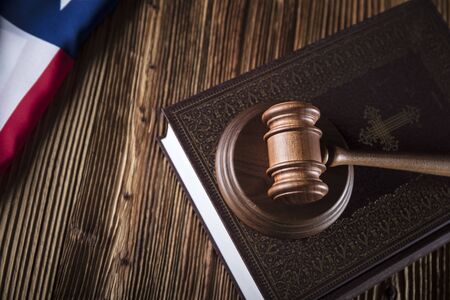 American law concept. Gavel of the judge and american flag.