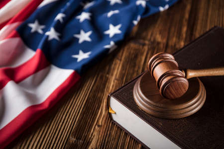 American law concept. Gavel of the judge and american flag.