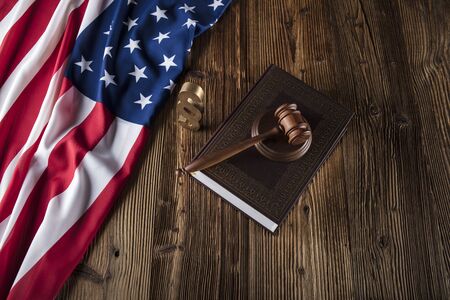 American law concept. Gavel of the judge and american flag.