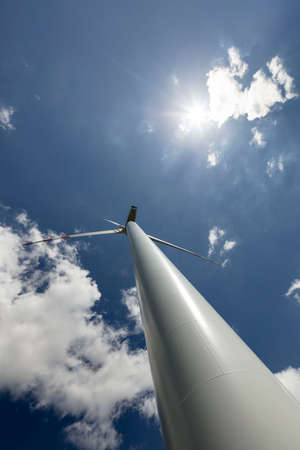 Renewable energy. Farm of wind turbines on the corn field.の写真素材
