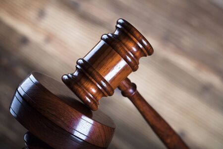 Auction and business concept.  Gavel on the wooden background.の写真素材