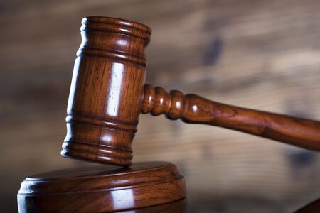 Auction and business concept.  Gavel on the wooden background.の写真素材