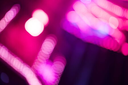 Casino bokeh lights. Pattern of defocused blue and red lights.の写真素材