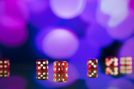 Dice on bokeh background. Casino concept.