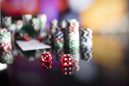 Casino concept. Dice game. Poker game. Colorful bokeh.の写真素材